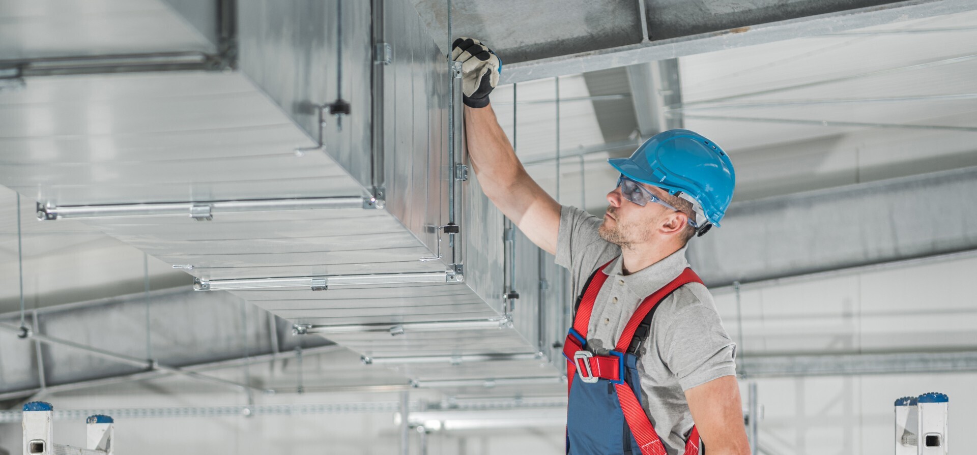 man working on vents 